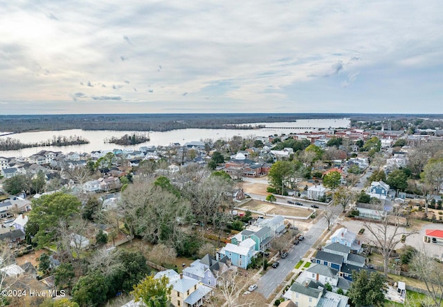 drone / aerial view with a water view