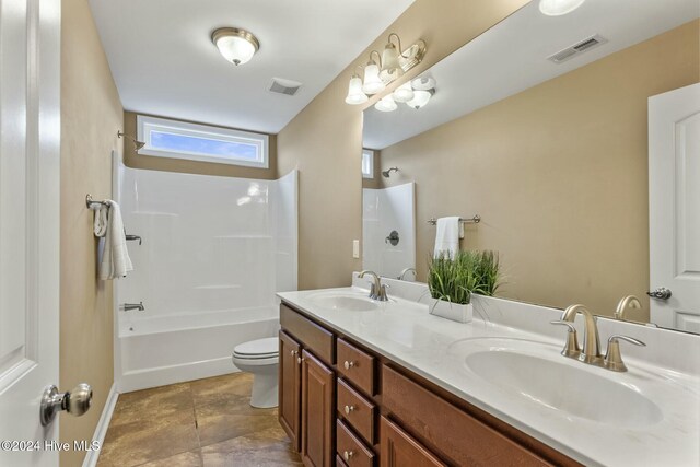 full bathroom featuring vanity, toilet, and shower / bath combination