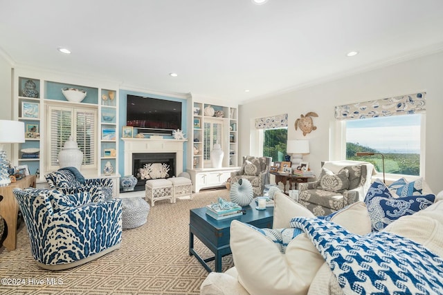 carpeted living room featuring ornamental molding