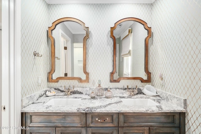 bathroom featuring vanity and ornamental molding