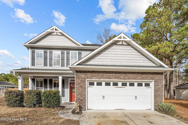 craftsman inspired home featuring a garage