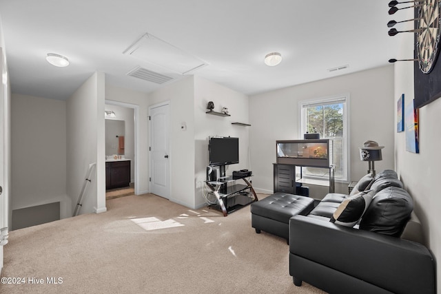 living room featuring light carpet