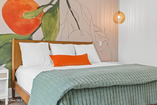 bedroom featuring wood-type flooring