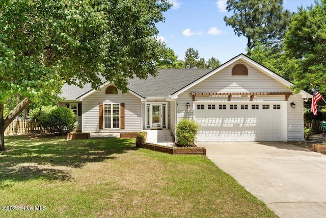 4 Emerald Ln, Pinehurst, NC 28374 - ranch-style home with driveway, a garage, and roof with shingles
