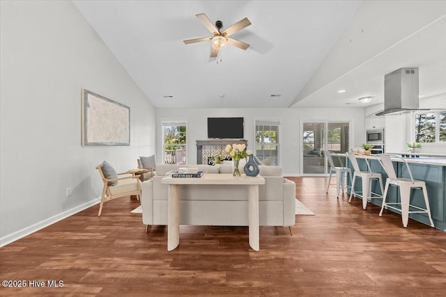 4 Emerald Ln, Pinehurst, NC 28374 - living area featuring a ceiling fan, wood finished floors, high vaulted ceiling, baseboards, and a fireplace