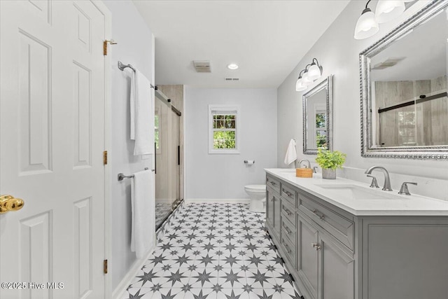 4 Emerald Ln, Pinehurst, NC 28374 - bathroom featuring tile patterned floors, a shower stall, double vanity, toilet, and baseboards