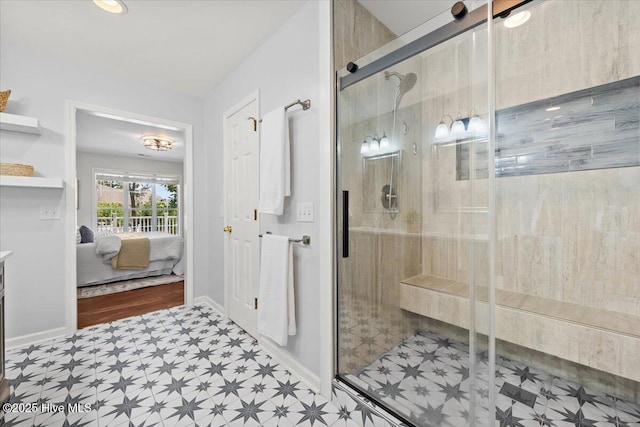 4 Emerald Ln, Pinehurst, NC 28374 - ensuite bathroom with tile patterned floors, a stall shower, and baseboards