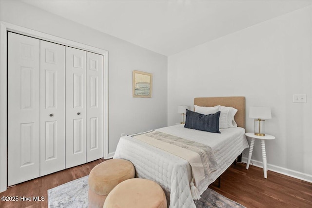 4 Emerald Ln, Pinehurst, NC 28374 - bedroom featuring wood finished floors, baseboards, and a closet