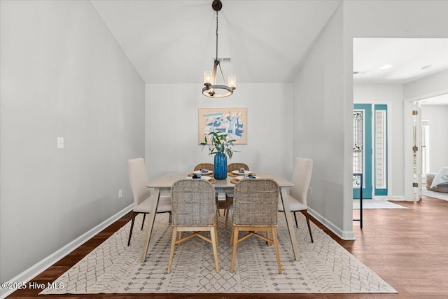 4 Emerald Ln, Pinehurst, NC 28374 - dining area with wood finished floors, baseboards, and a chandelier
