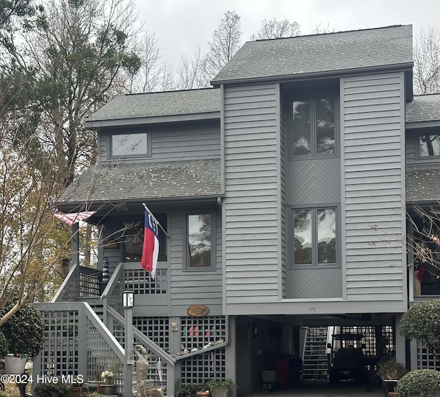 view of front of home featuring a carport