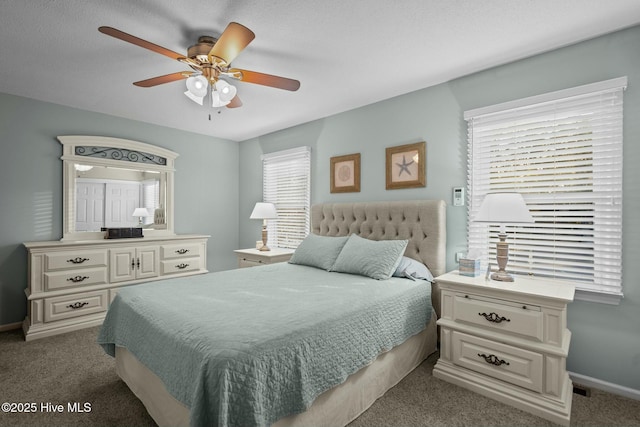 bedroom featuring ceiling fan and carpet floors