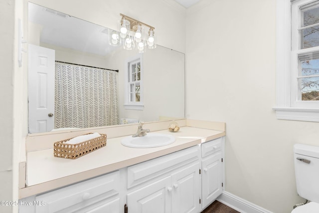 bathroom with vanity and toilet