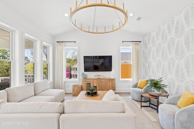 living room featuring hardwood / wood-style floors and lofted ceiling