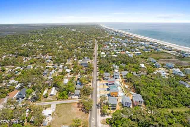 aerial view featuring a water view and a view of the beach