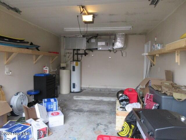 garage featuring a garage door opener and water heater