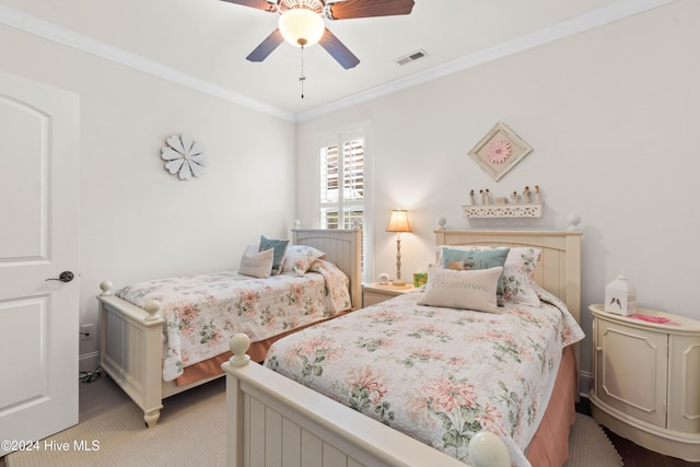 bedroom featuring crown molding, ceiling fan, and light carpet