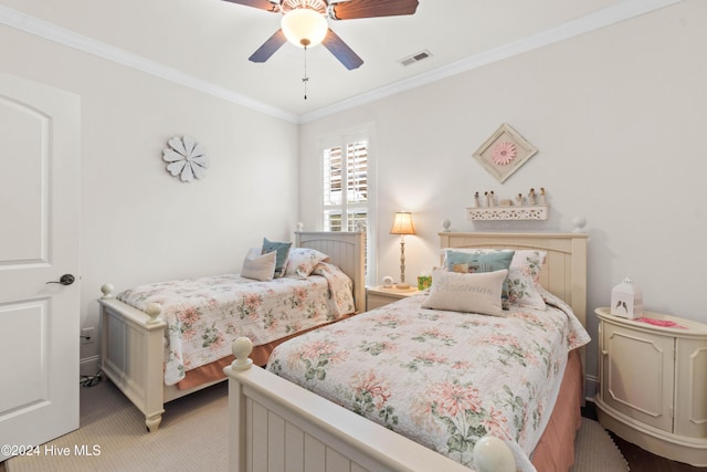 bedroom featuring crown molding, light carpet, a ceiling fan, and visible vents