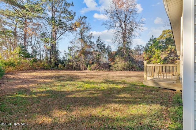 view of yard with a deck