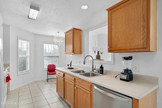 kitchen with sink, hanging light fixtures, stainless steel dishwasher, white range oven, and light tile patterned floors