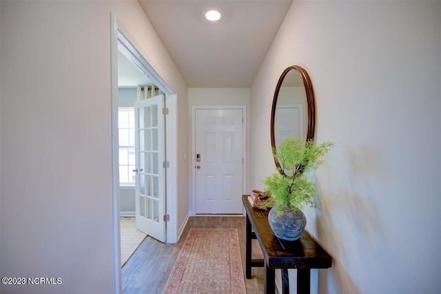 entryway with light hardwood / wood-style floors