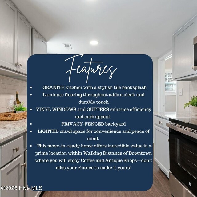 kitchen with tasteful backsplash, sink, light stone counters, and stainless steel appliances