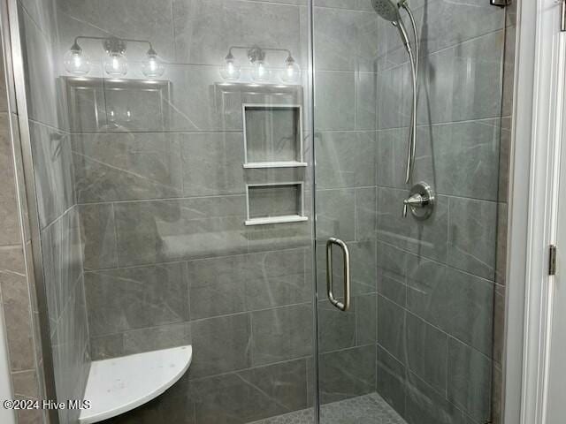 bathroom featuring walk in shower