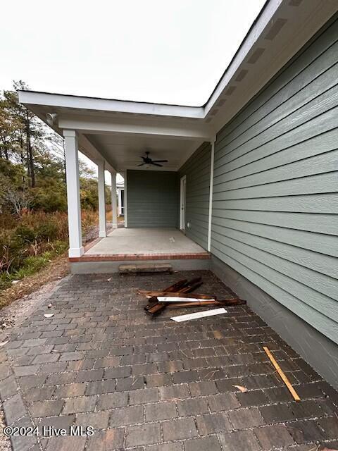 view of patio with ceiling fan