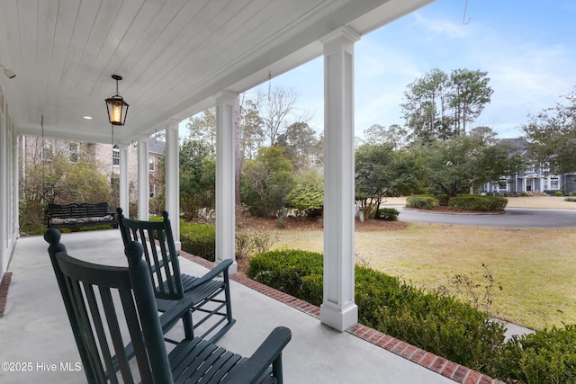 view of patio featuring a porch