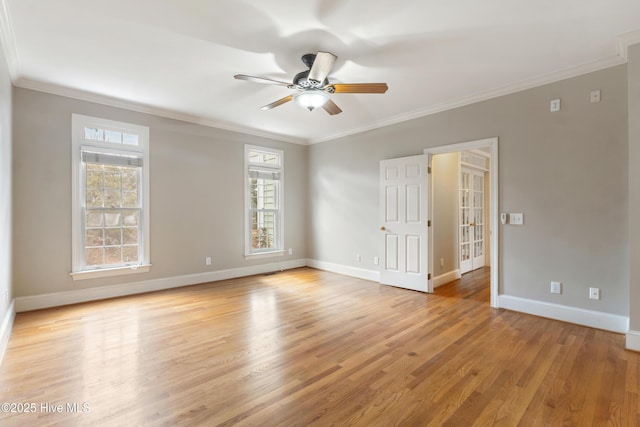 unfurnished room featuring ceiling fan, light hardwood / wood-style flooring, and crown molding