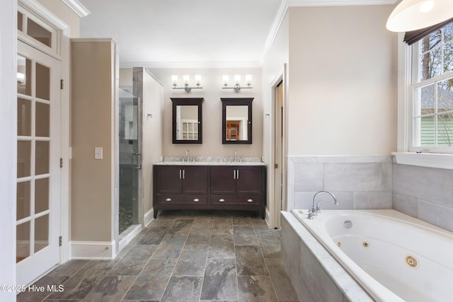 bathroom with vanity, shower with separate bathtub, and ornamental molding