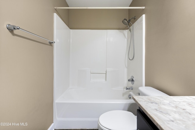 full bathroom featuring shower / washtub combination, vanity, and toilet