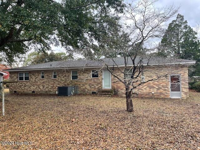 back of house with cooling unit