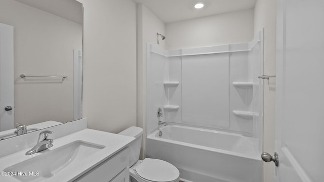 bathroom featuring shower / washtub combination, vanity, and toilet