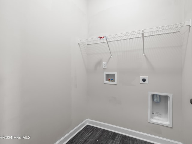 clothes washing area featuring hookup for an electric dryer, washer hookup, and dark hardwood / wood-style floors