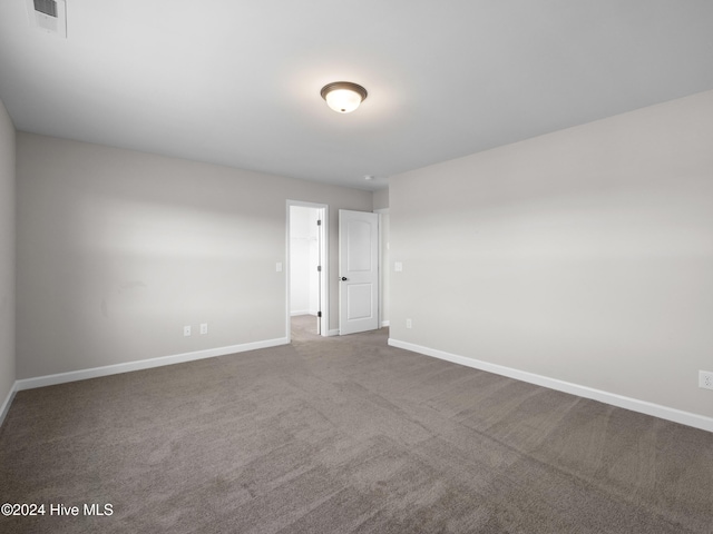 empty room featuring carpet floors