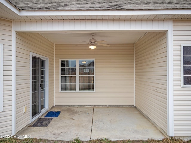 view of patio featuring ceiling fan