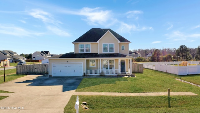 view of front of house with a front lawn, a porch, and a garage