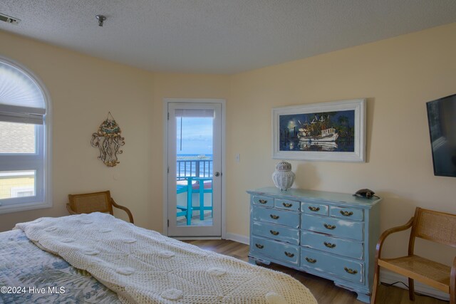 bedroom with light wood-type flooring