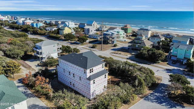 aerial view with a residential view and a water view