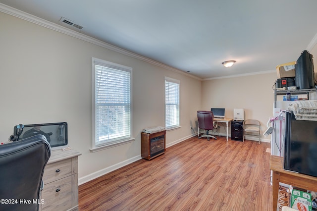 office featuring light hardwood / wood-style floors and ornamental molding