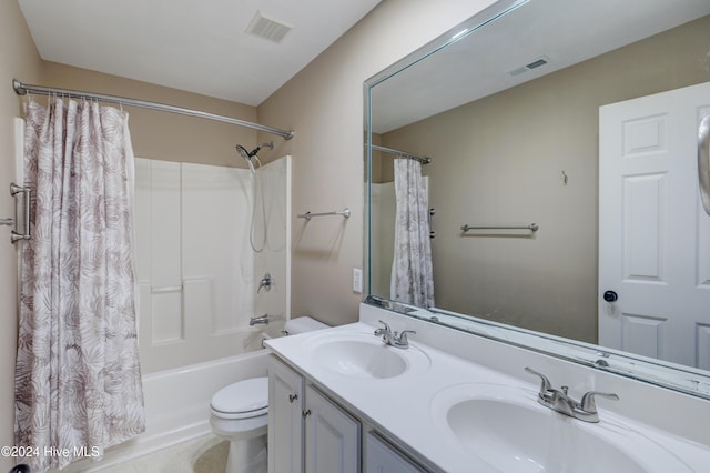 full bathroom with vanity, toilet, and shower / bathtub combination with curtain