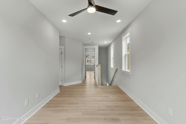 corridor featuring light hardwood / wood-style flooring