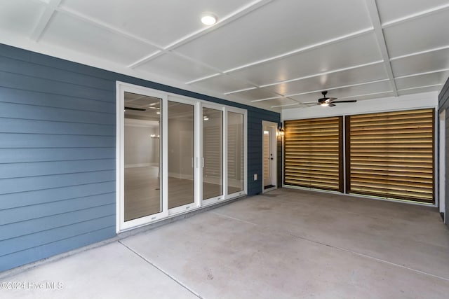 view of patio featuring ceiling fan