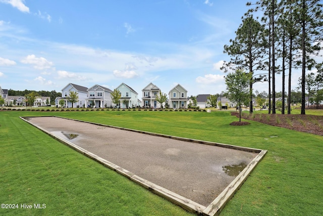 view of community featuring a lawn