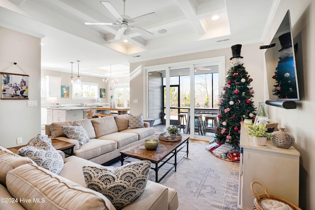 living room featuring coffered ceiling, ceiling fan with notable chandelier, crown molding, beam ceiling, and light hardwood / wood-style floors