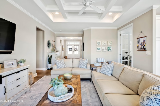 living room with french doors, ornamental molding, coffered ceiling, and hardwood / wood-style floors