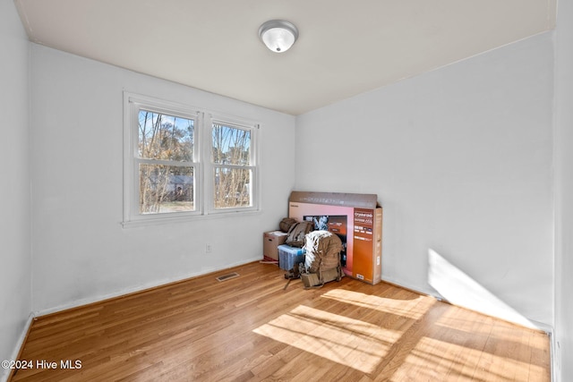 sitting room featuring light hardwood / wood-style flooring