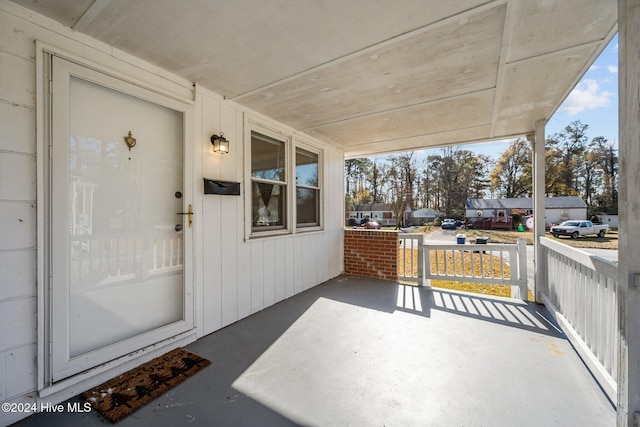 view of patio featuring covered porch