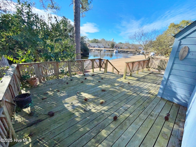 deck featuring a water view