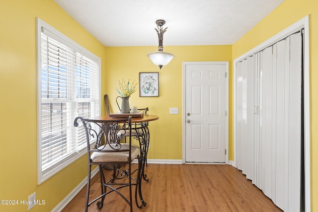 dining area with light wood-type flooring